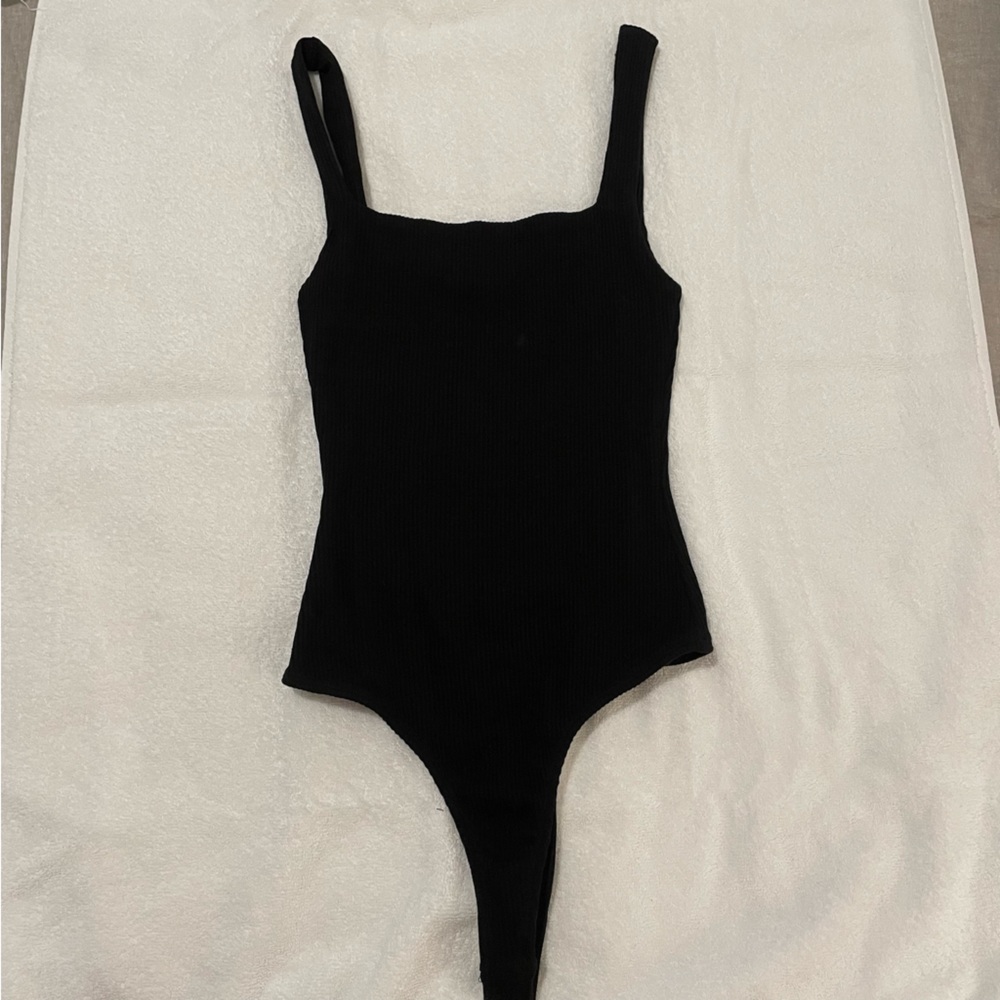 black ribbed body suit